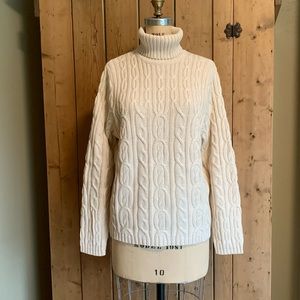 100% cotton cable knit sweater.